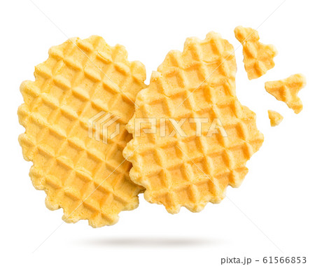 Waffle cookies fly close-up on a white background 61566853