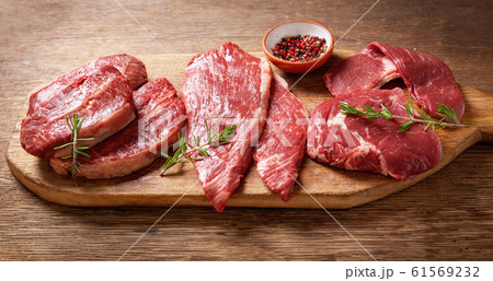 fresh meat with rosemary and spices 61569232