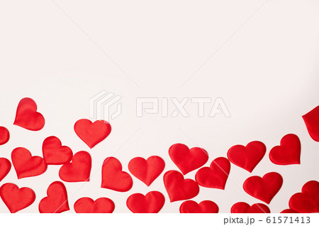 Valentine's Day. Many red hearts on a white background.Texture. Free space on top. Valentine's Day. Many red hearts on a white background.Texture. Free space on top. 61571413