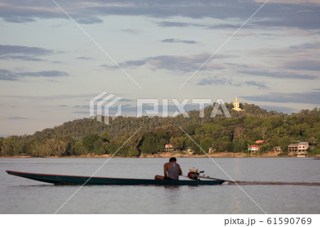 Buddha statue on Mekong river Buddha statue on Mekong river 61590769