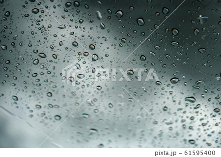 blur backgruond,Rain water on the car glass. blur backgruond,Rain water on the car glass. 61595400