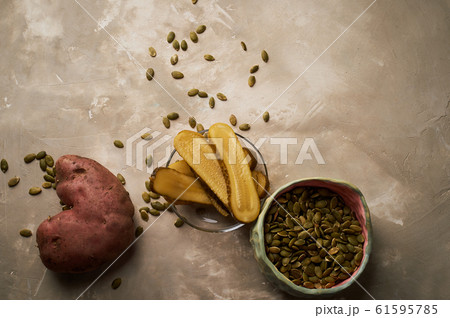 Ugly food, potatoes in the shape of a heart.Natural and simple farm products. Ugly food, potatoes in the shape of a heart.Natural and simple farm products. 61595785