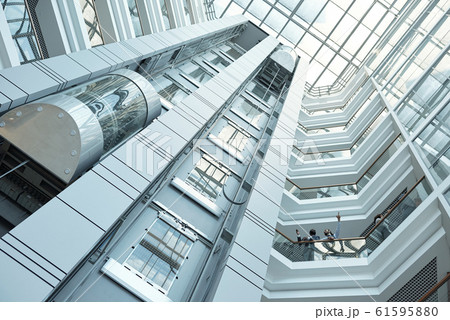 Below view of elevator, walls and balconies of contemporary business center Below view of elevator, walls and balconies of contemporary business center 61595880
