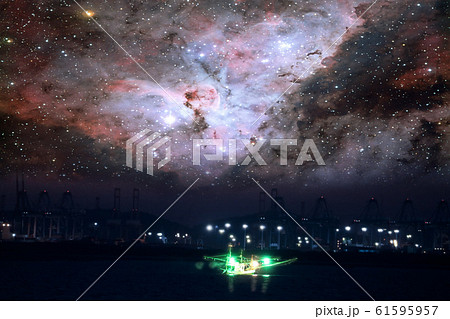 Nebula in galaxy over silhouette seaport and Nebula in galaxy over silhouette seaport and 61595957