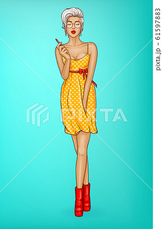 girl with sexy lips holds red lipstick. 61597883