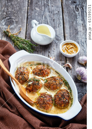 rabbit ballotine in a ceramic baking dish rabbit ballotine in a ceramic baking dish 61599151