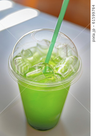 Tarragon lemonade with ice cubes 61599764