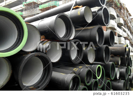 Underground sewerage pipe stacking at the storage area in the construction site.  61603235