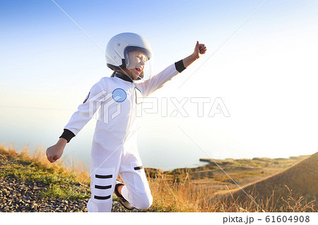 Astronaut futuristic kid girl with white full Astronaut futuristic kid girl with white full 61604908