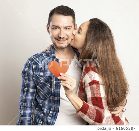 Pretty loving couple celebrating Valentine's day Pretty loving couple celebrating Valentine's day 61605587