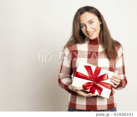 Beautiful woman with present Beautiful woman with present 61606101