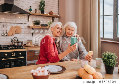 Two mature grey-haired positive ladies making pictures Two mature grey-haired positive ladies making pictures 61606104