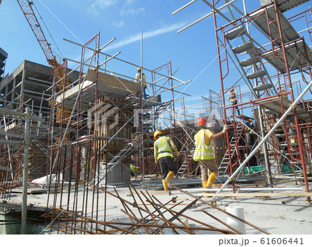 Scaffolding used as the temporary structure to support platform, form work and structure at the construction site. Also used it as a walking platform for workers. Scaffolding used as the temporary structure to support platform, form work and structure at the construction site. Also used it as a walking platform for workers. 61606441