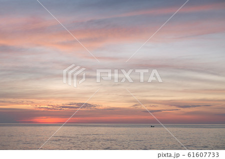Sea pink sunset. Beautiful color clouds. 61607733