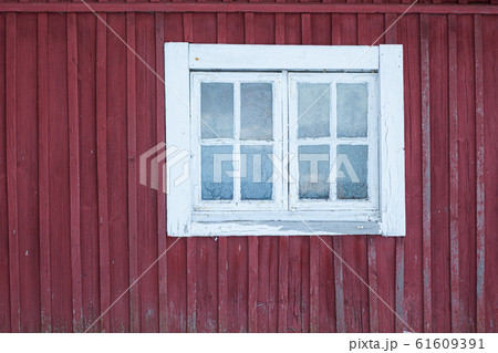 Old shed frozen window and wall at winter 61609391