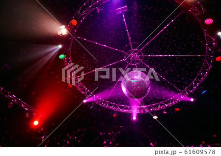 The disco ball with light rays in night club. Party background. 61609578
