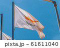 The national flag of Cyprus. Light flag on the flagpole. The summer wind flutters the flag. 61611040