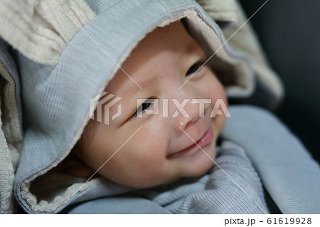 little cute baby happy smile with wearing warm clothing bunny suit 61619928