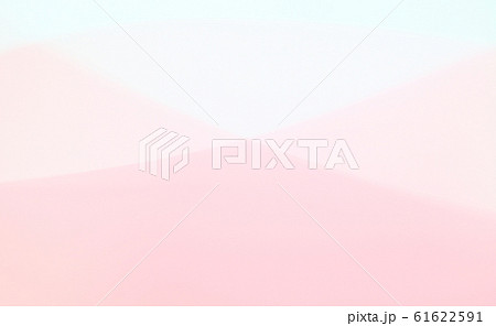 ピンク色系パステルカラーの抽象的背景素材ーゆるやかなラインの写真素材