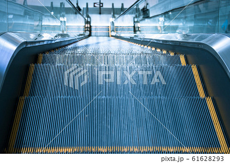 Escalator stairs in station. 61628293
