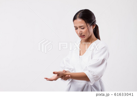 woman suffering from trigger finger, cps, wrist woman suffering from trigger finger, cps, wrist 61633041