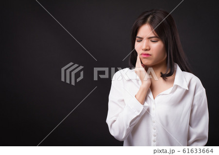 painful woman with toothache, tooth decay, 61633664