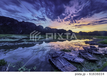 Landscape with boat in Van Long natural reserve in Ninh Binh, Vietnam Landscape with boat in Van Long natural reserve in Ninh Binh, Vietnam 61636034