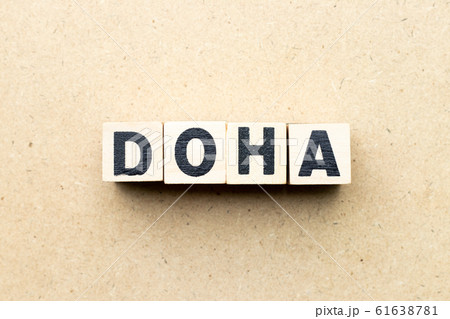 Letter block in word Doha on wood background Letter block in word Doha on wood background 61638781