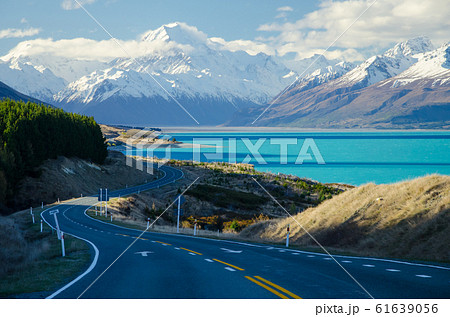 Snow covered Mount Cook with Lake Pukaki and road in the foreground from Peters Lookout, South Island, New Zealand 61639056