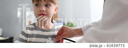 Joyful girl in clinic 61639773