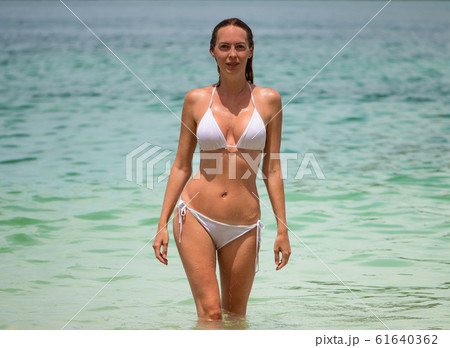 Young slim beautiful girl stay and posing in the 61640362