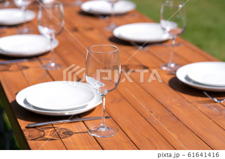 Served wooden table without a tablecloth. Cafe in Served wooden table without a tablecloth. Cafe in 61641416
