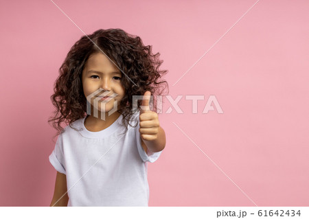 Portrait of a pretty curly little girl Portrait of a pretty curly little girl 61642434
