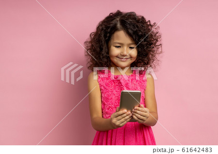 Portrait of a happy little girl Portrait of a happy little girl 61642483