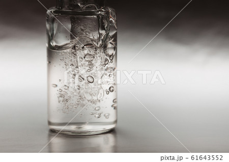 Macro photo of bottle with collagen Macro photo of bottle with collagen 61643552