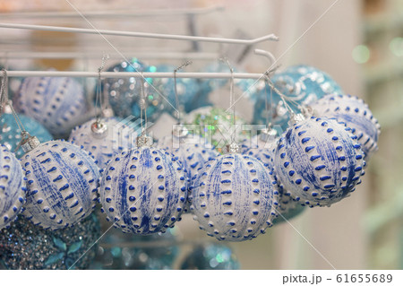 blue christmas balls in the store for decoration. blue christmas balls in the store for decoration. 61655689