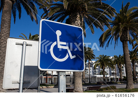 Sign for disabled parking close-up. A clear sunny day. 61656176