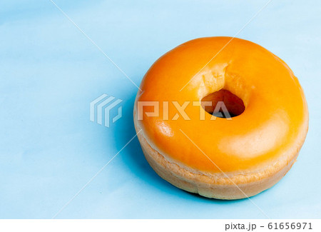 Donut bread on a blue background Donut bread on a blue background 61656971