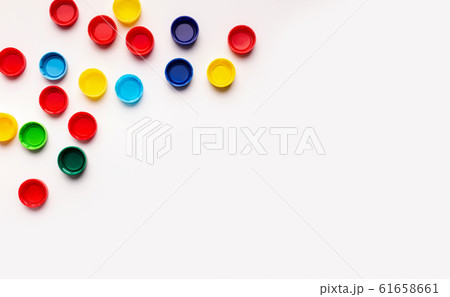 Colored frame plastic covers from bottles isolated on white Colored frame plastic covers from bottles isolated on white 61658661