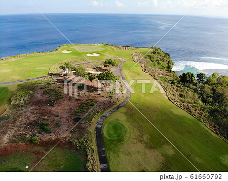 Aerial view luxury golf field next the cliff, Bali 61660792