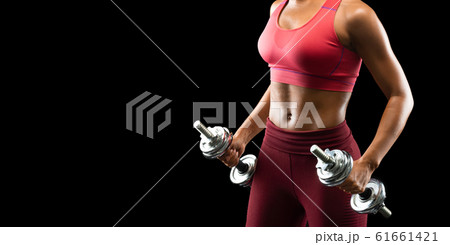 African girl making work out with barbells 61661421