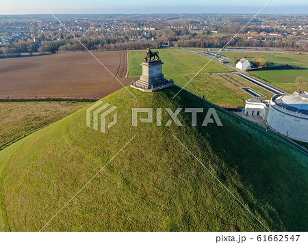Aerial view of The Lion's Mound with farm land around. Belgium Aerial view of The Lion's Mound with farm land around. Belgium 61662547