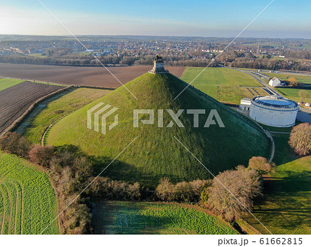 Aerial view of The Lion's Mound with farm land around. Belgium 61662815