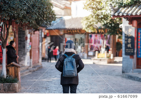 young woman traveler traveling at the Square young woman traveler traveling at the Square 61667099