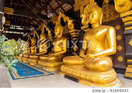 Row of Buddha Statues in Wat Phra That Doi Phra Chan in Mae Tha District 61669835