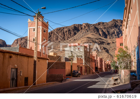 Orange houses with canyons in the background, Tinghir, Morocco 61670619
