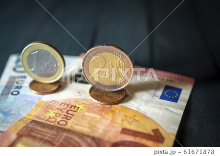 Euro cash in close-up with coins 61671878