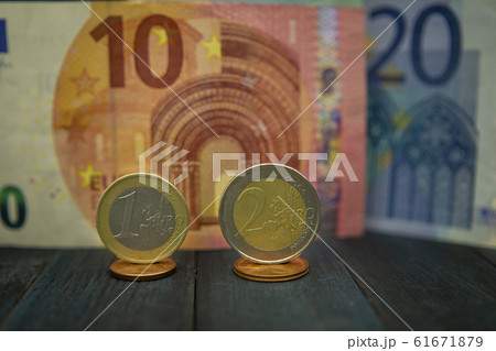 Euro cash in close-up with coins 61671879