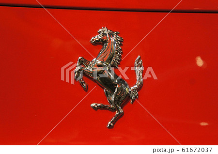 Selected focused of Ferrari car brand emblem and logos. Ferrari is an Italian luxury sports car manufacturer based in Maranello. 61672037