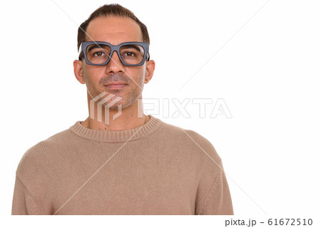 Mature handsome Persian nerd man with eyeglasses Mature handsome Persian nerd man with eyeglasses 61672510
